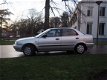 Suzuki Baleno - 1.6 GLX 16V 4 deurs Sedan - 1 - Thumbnail