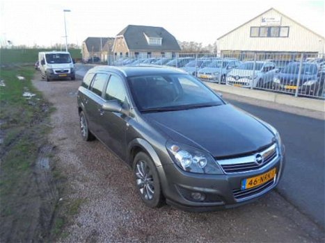 Opel Astra Wagon - 1.6 111 years Edition astra 1.6 benzine staion airco lmv trekhaak navigatie pdc - 1