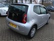 Volkswagen Up! - UP 1.0 75PK HIGH UP *AIRCO - NAVIGATIE - 1 - Thumbnail