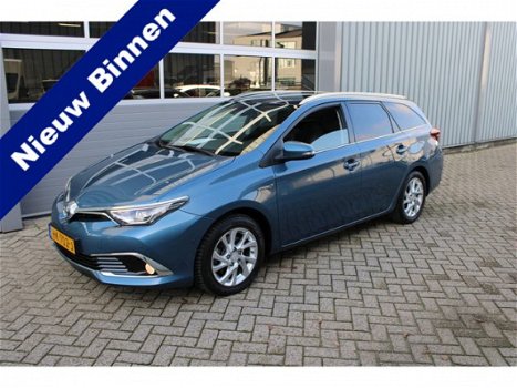 Toyota Auris Touring Sports - 1.8 Hybrid Lease pro 1e Eig Xenon Led Pano Navi Stoelverwarming - 1