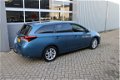 Toyota Auris Touring Sports - 1.8 Hybrid Lease pro 1e Eig Xenon Led Pano Navi Stoelverwarming - 1 - Thumbnail