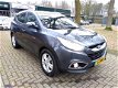 Hyundai ix35 - 1.6i GDI Business Edition AIRCO/CLIMA NWE APK NAVIGATIE ACHTERUITRIJCAMERA SPORTVELGE - 1 - Thumbnail