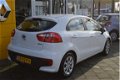 Kia Rio - 1.2 CVVT ComfortLine | Cruise control | Bluetooth | Airco | 5 Drs | Eerste eigenaar | Fabr - 1 - Thumbnail