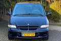 Chrysler Grand Voyager - 2.4i SE Luxe 78.353km NAP 1e Eigenaar - 1 - Thumbnail