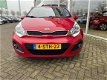 Kia Rio - 1.2 CVVT Plus Pack, Led dagrijverl. Airco, Radio/cd, Aux USB - 1 - Thumbnail