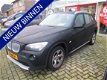 BMW X1 - sDrive18i Executive NL auto | 96.713 KM | navigatie | 150 PK | parkeersensoren - 1 - Thumbnail