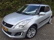 Suzuki Swift - 1.2 Exclusive AUTOMAAT - 1 - Thumbnail