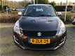 Suzuki Swift - 1.2 Dynamic Navigatie 5drs - 1 - Thumbnail