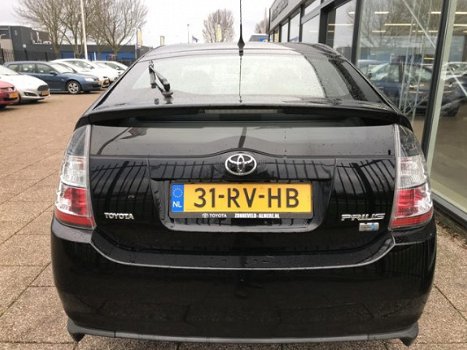 Toyota Prius - 1.5 VVT-i Hybride Automaat Climate Cruise Lichtmetaal - 1