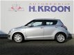 Suzuki Swift - 1.2 Comfort EASSS - Airco - tot 10 jaar garantie - 1 - Thumbnail