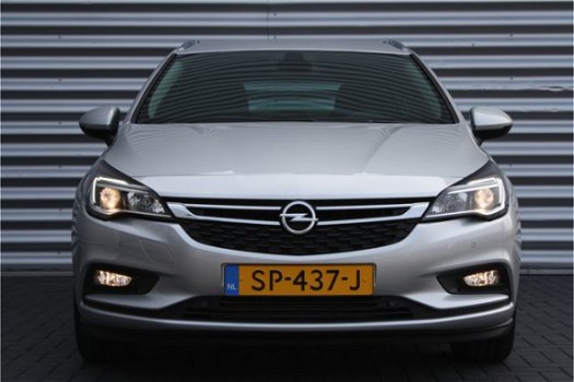 Opel Astra Sports Tourer - 1.4 TURBO 150PK ONLINE EDITION+ / NAVI / CLIMA / LED / AGR / PDC / 16