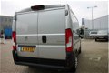 Peugeot Boxer - GB 330 L1H1 BlueHDi 130PK Premium Pack Airco, Cruise control, Camera, Voorraad Voord - 1 - Thumbnail