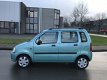 Suzuki Wagon R+ - 1.2 Comfort Stuurbekr., CPV, Elektr.ramen, Radio-CD, Enz..... Leuke, zuinige en on - 1 - Thumbnail