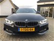 BMW 4-serie Coupé - 420i High Executive Automaat |Leder|Headup|Camera - 1 - Thumbnail