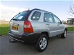 Kia Sportage - 2.0 CVVT Executive LEDER AIRCO APK tot 01-2021 - 1 - Thumbnail