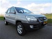 Kia Sportage - 2.0 CVVT Executive LEDER AIRCO APK tot 01-2021 - 1 - Thumbnail