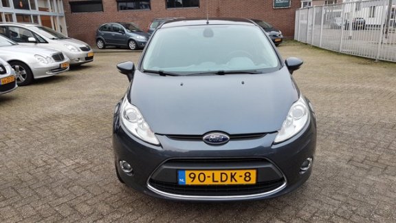 Ford Fiesta - 1.25 Titanium X-Pack 82 Pk - 5 Deurs - Airco ecc - Cruise - L.m velgen - Pdc - 1