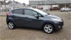 Ford Fiesta - 1.25 Titanium X-Pack 82 Pk - 5 Deurs - Airco ecc - Cruise - L.m velgen - Pdc - 1 - Thumbnail