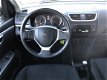 Suzuki Swift - 1.2 Comfort | Radio/CD | Stoelverwarming | Elektrische ramen | Airco | Staat in Harde - 1 - Thumbnail