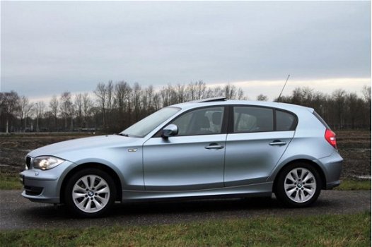 BMW 1-serie - 116i Business Line Edition 122 Pk Schuif/Kanteldak Bi-Xenon Navi Trekhaak - 1