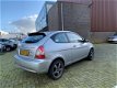 Hyundai Accent - 1.4i Dynamic Airco 3drs Nieuwe APK NAP - 1 - Thumbnail