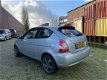 Hyundai Accent - 1.4i Dynamic Airco 3drs Nieuwe APK NAP - 1 - Thumbnail