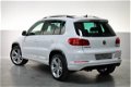 Volkswagen Tiguan - 2.0 TSI R-line 211pk Leer Xenon Pano Navi 4motion DSG - 1 - Thumbnail