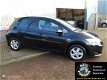 Toyota Auris - 1.4-16V Sol, Airco/clima, cruise control, lmv, trekhaak, 2e eigenaar - 1 - Thumbnail