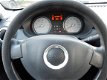 Dacia Sandero - 1.2 Blackline incl Airco en set winterbanden met velgen - 1 - Thumbnail