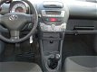 Toyota Aygo - 1.0-12V Dynamic Navigator NAVI, Lichtmetalen velgen - 1 - Thumbnail