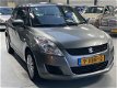 Suzuki Swift - 1.2 Comfort EASSS Airco 5drs 94pk Org. NL auto - 1 - Thumbnail