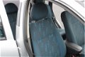 Opel Corsa - 1.2-16V Comfort - 1 - Thumbnail