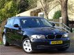 BMW 1-serie - 116i Business Line | 5drs. | PDC | Xenon | - 1 - Thumbnail