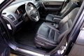 Honda CR-V - 2.0i Executive Aut. Leder/Xenon/Navi/Pano/Enz - 1 - Thumbnail