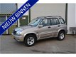 Suzuki Grand Vitara - 2.0 METAL TOP LONG BODY NAP AIRCO LMV - 1 - Thumbnail