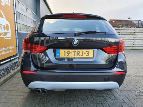 BMW X1 - SDrive20i Business Dealer onderhouden Climate & Cruise control, Navigatie, PDC, Zonnedak, - 1