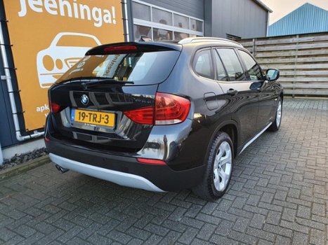 BMW X1 - SDrive20i Business Dealer onderhouden Climate & Cruise control, Navigatie, PDC, Zonnedak, - 1