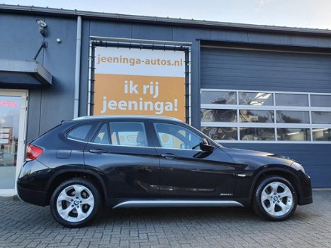 BMW X1 - SDrive20i Business Dealer onderhouden Climate & Cruise control, Navigatie, PDC, Zonnedak, - 1