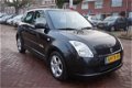 Suzuki Swift - 1.5 Exclusive 5 DRS HB - 1 - Thumbnail