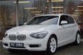 BMW 1-serie - 118i 170 pk High Executive Navi Leder Clima Schuifdak Pdc - 1 - Thumbnail