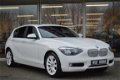 BMW 1-serie - 118i 170 pk High Executive Navi Leder Clima Schuifdak Pdc - 1 - Thumbnail