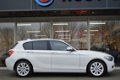 BMW 1-serie - 118i 170 pk High Executive Navi Leder Clima Schuifdak Pdc - 1 - Thumbnail