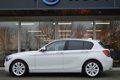 BMW 1-serie - 118i 170 pk High Executive Navi Leder Clima Schuifdak Pdc - 1 - Thumbnail