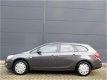 Opel Astra Sports Tourer - Winterbanden/Navi/1.4 Turbo Bns + - 1 - Thumbnail