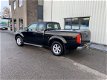 Nissan Navara - 2.5 dCi SE King Cab 4x4 , Airco, Trekhaak 3000 kg - 1 - Thumbnail