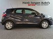 Renault Captur - 0.9 TCe Limited Navigatie Rijklaar + 6 maanden Bovag-garantie - 1 - Thumbnail