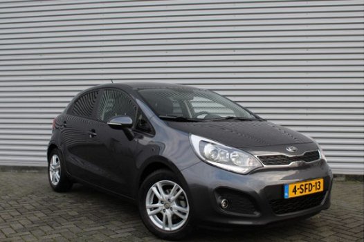 Kia Rio - 1.2 CVVT Plus Pack | Navi | Airco | Cruise | Weinig km | Keurig nette auto | 15