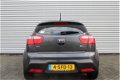 Kia Rio - 1.2 CVVT Plus Pack | Navi | Airco | Cruise | Weinig km | Keurig nette auto | 15