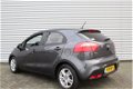 Kia Rio - 1.2 CVVT Plus Pack | Navi | Airco | Cruise | Weinig km | Keurig nette auto | 15