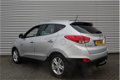 Hyundai ix35 - 1.6i GDI Business Edition | Navi | Cruise | Trekhaak | Camera | Keurig nette auto | W - 1 - Thumbnail